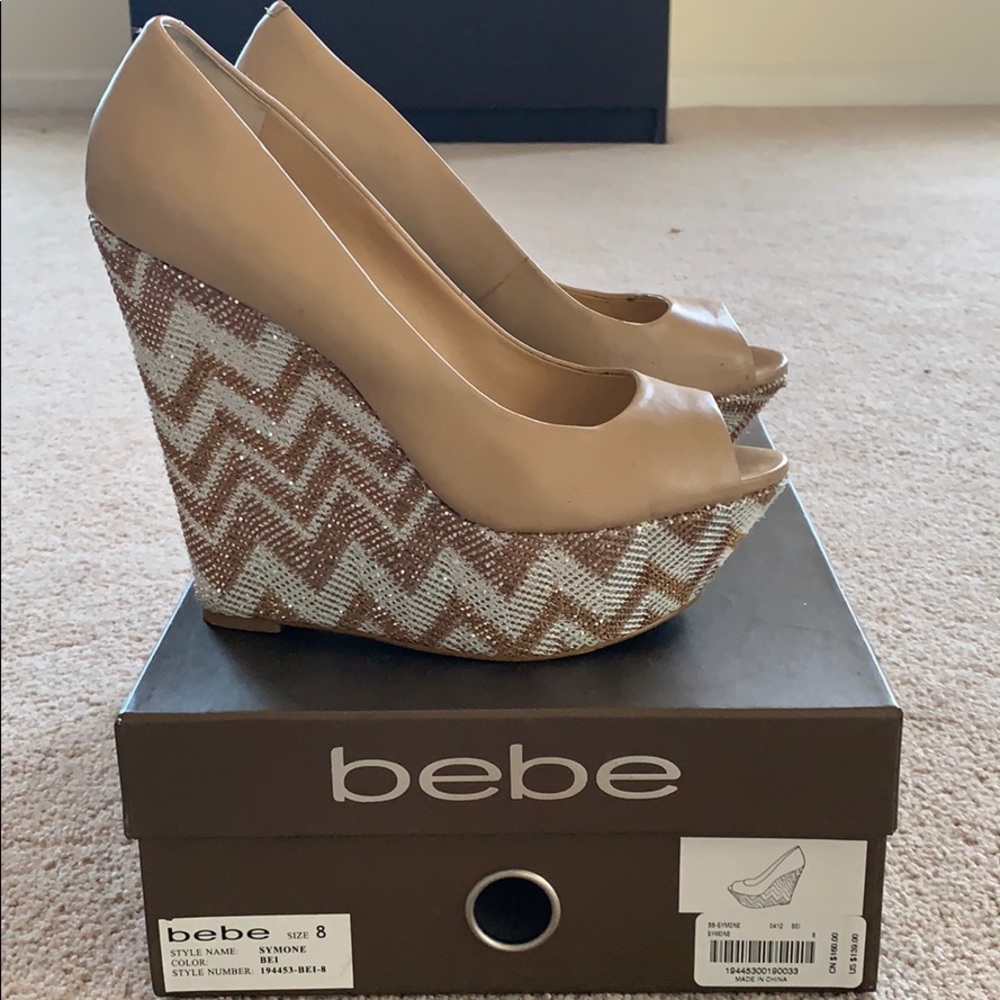 platform peep toe wedge by bebe